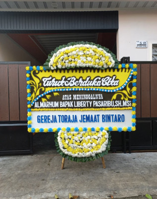 Papan Bunga Duka di Pamarayan